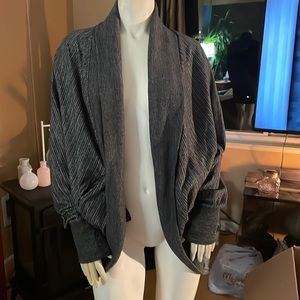 Gray slouchy type of sweater
